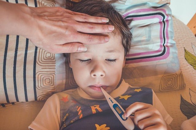 Tips For How To Fight Your Child's Fever (and What You Should Avoid)